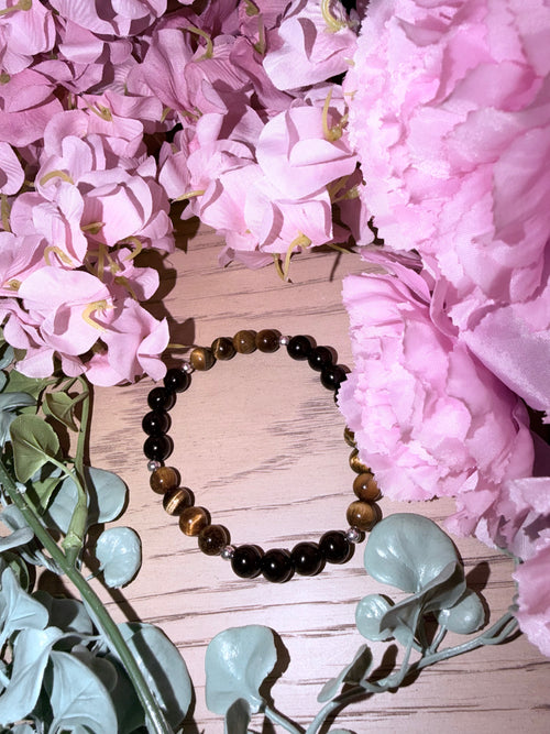 handmade black onyx and tiger's eye crystal bracelet for protection and confidence
